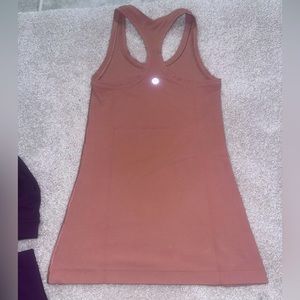 Lululemon burgundy shorts sports bra and burnt orange tank top